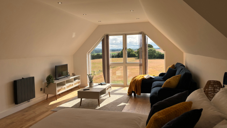 Image of the inside of the accommodation and beautiful view out of the window