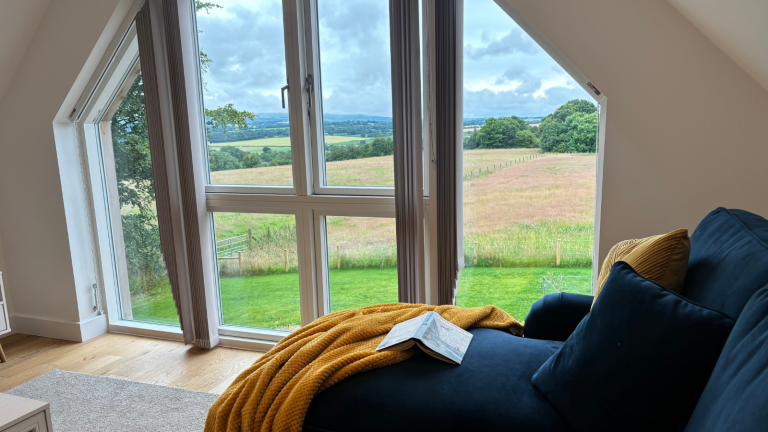 Image of the inside of the accommodation and beautiful view out of the window